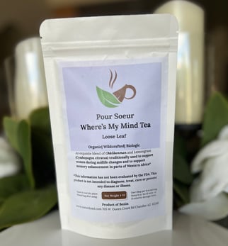 A bag go loose leaf tea in white paper bag with purple label A bag go loose leaf tea in white paper bag with purple label